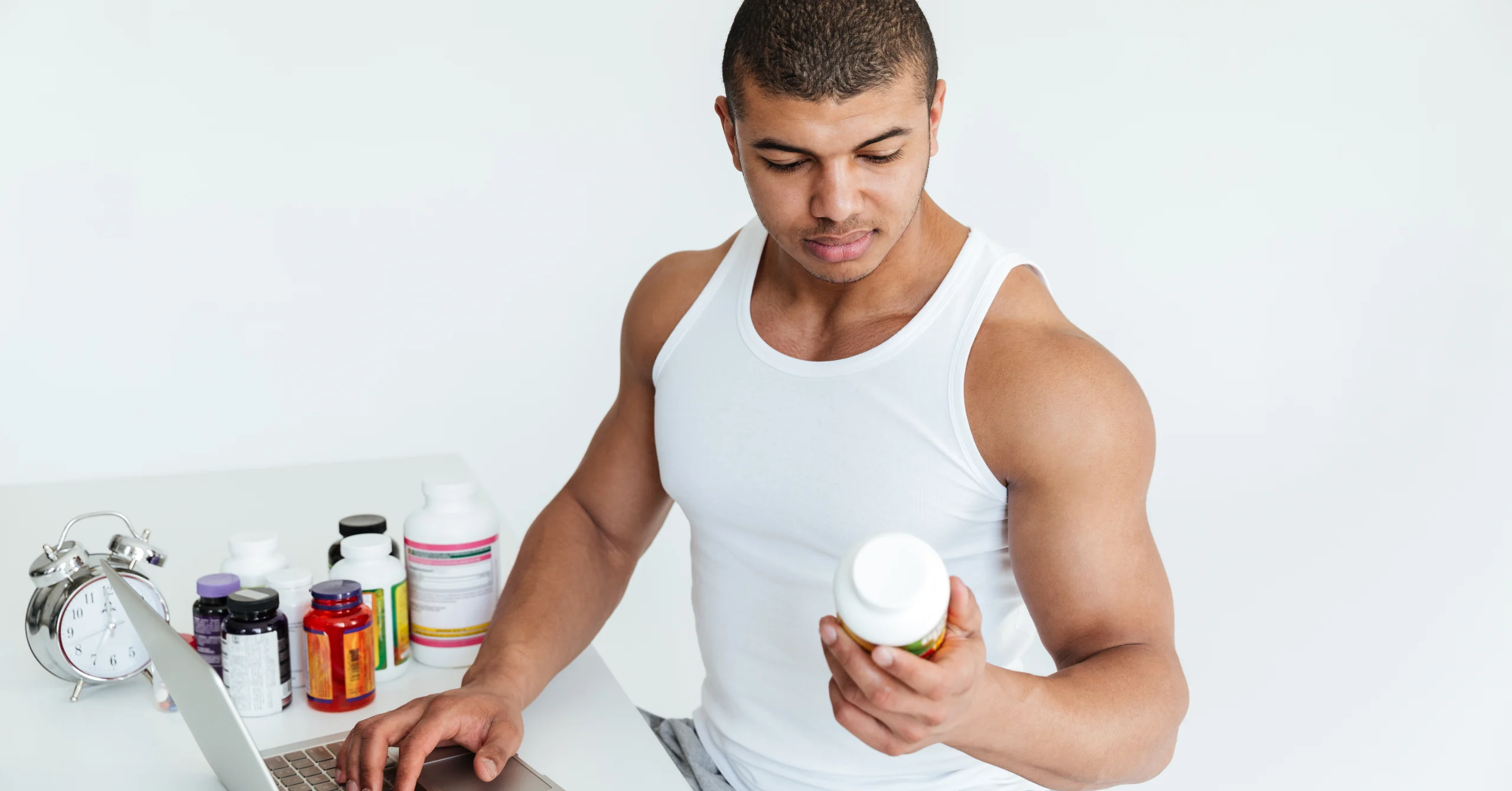 bodybuilder taking supplements